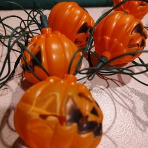 vintage charm to your Halloween decorations with these blinking string pumpkins